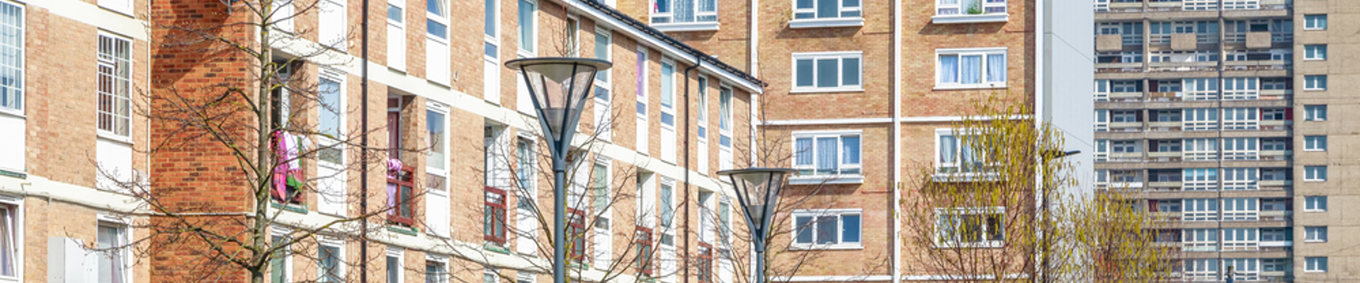 Several blocks of flats in a city.