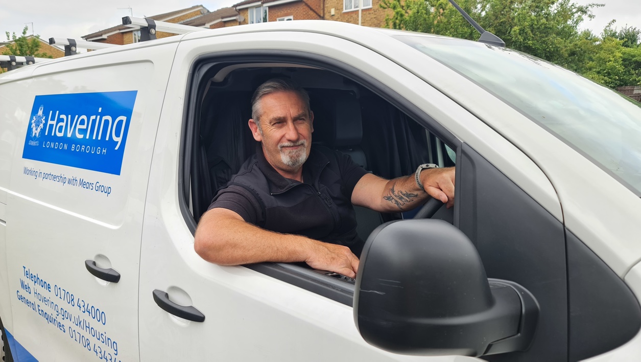 repair person in a Havering van