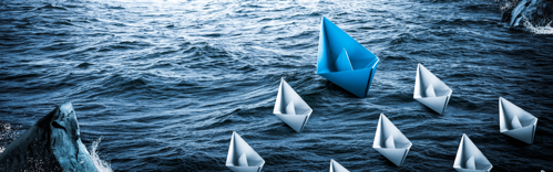 boats following a fleet, showing leadership